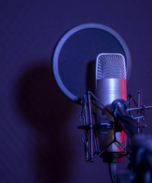 Microphone in radio station broadcasting studio.